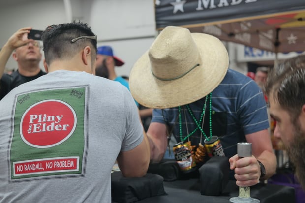 Test of Strength, arm wrestling over at the Martin House booth.