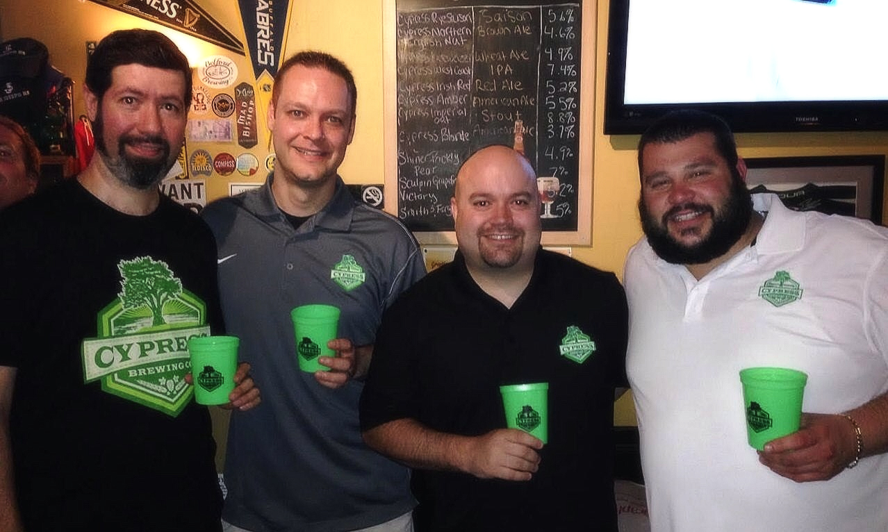 From left to right: Moshe Atzbi (Manager of Haileys Harp & Pub), Cypress Brewing co-owners Jason Kijowski, Bill Lutz and Charles Backmann (head brewer, co-owner)