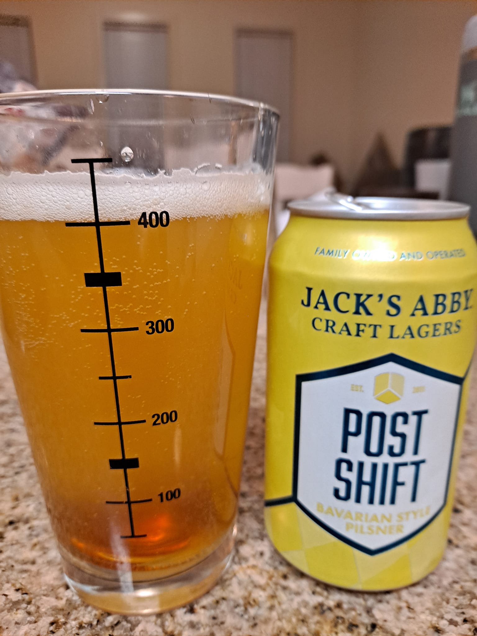 Post Shift by Jack’s Abby Craft Lagers poured in the measuring glass