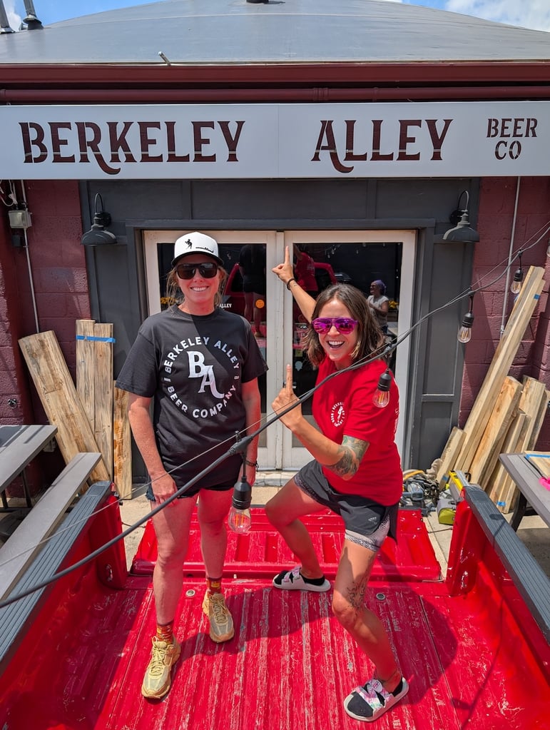 Two women standing in front of Berkley Alley Brewing Co.