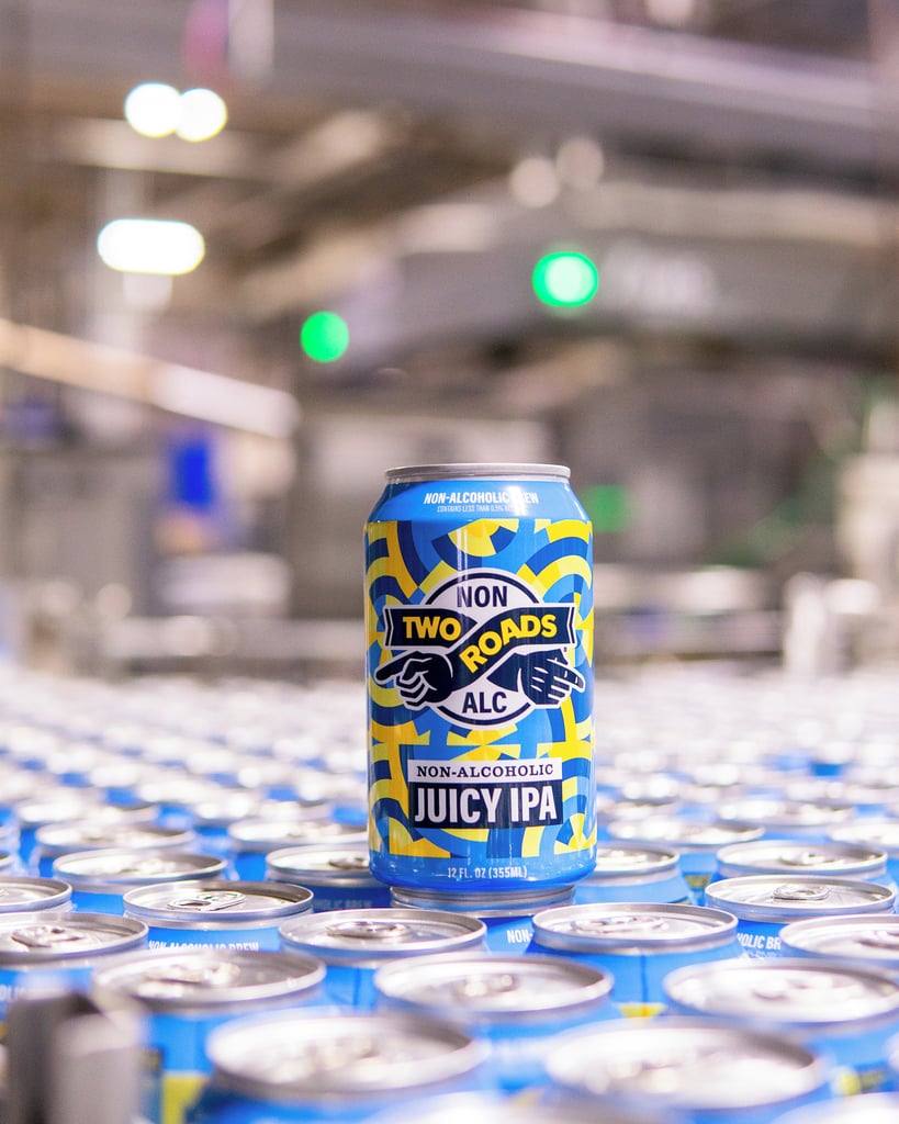two roads brewing non-alcoholic juicy ipa cans in warehouse