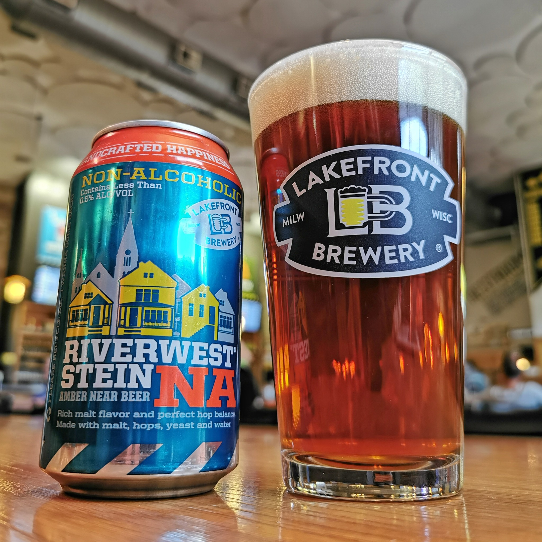 Lakefront brewery riverwest stein NA amber lager can and branded pint glass