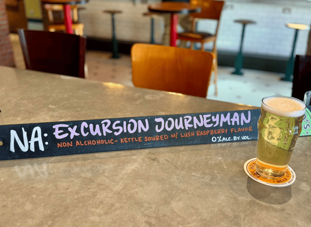 fat head's brewery excursion journeyman tap handle and nonic pint glass