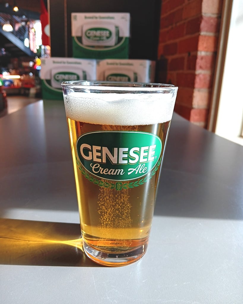 glass of shimmering genesee cream ale at the genesee brew house