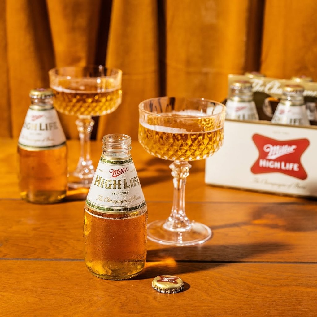 best cheap beer picks: miller high life in chintzy champagne glasses next to six-pack