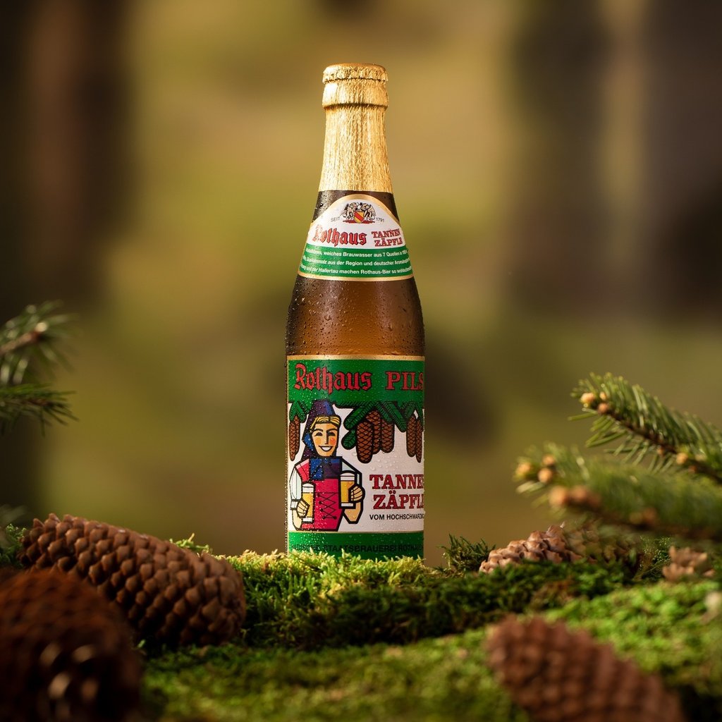 Rothaus Tannenzäpfle beer bottle in pine forest.