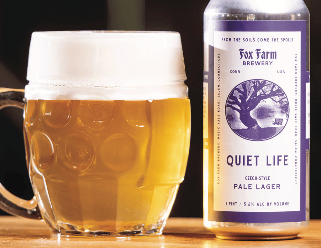 Quiet Life beer can and glass.