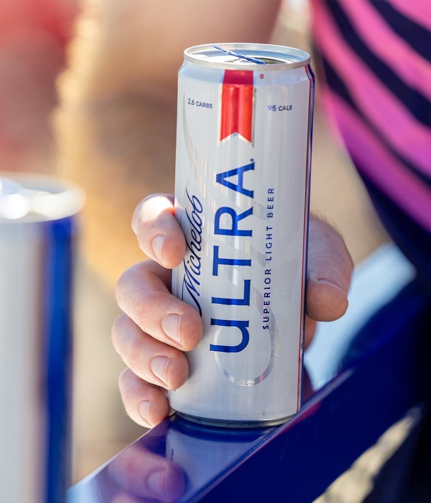 michelob ultra can being held outside