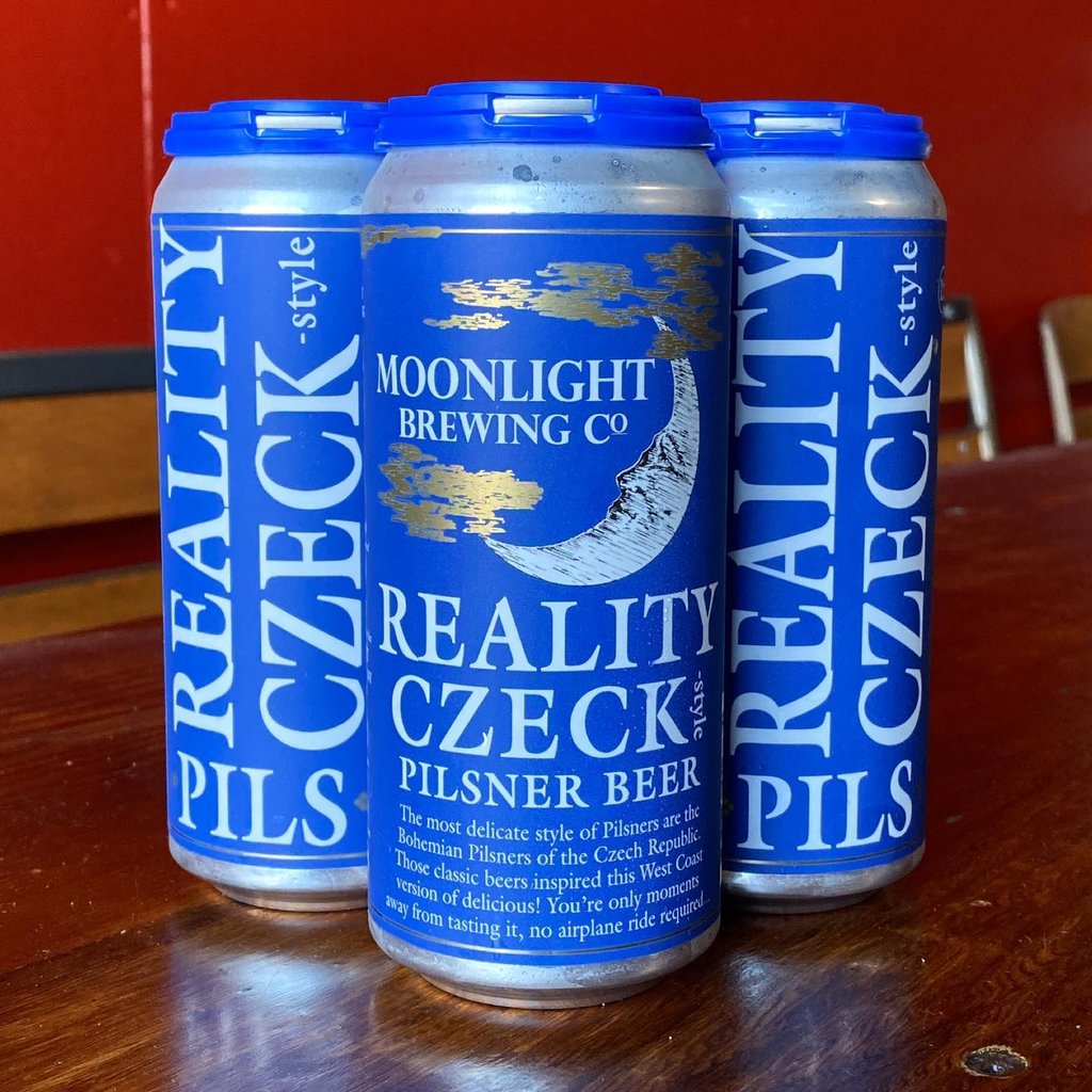 Moonlight Brewing Co. Reality Czeck four-pack on table.