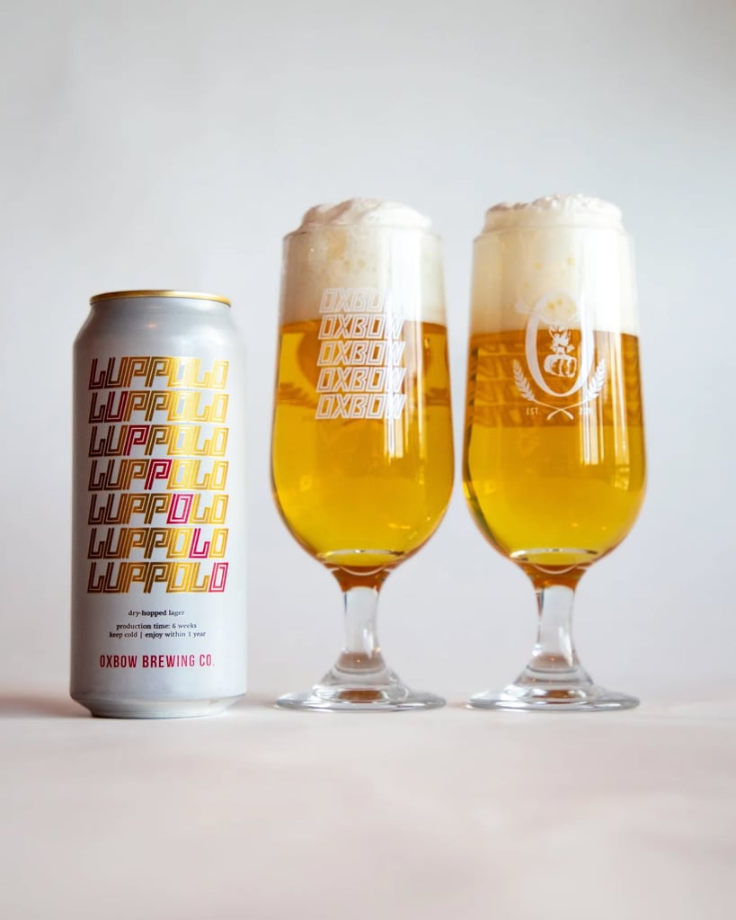 Oxbow Brewing Co. Luppolo can and two glasses.