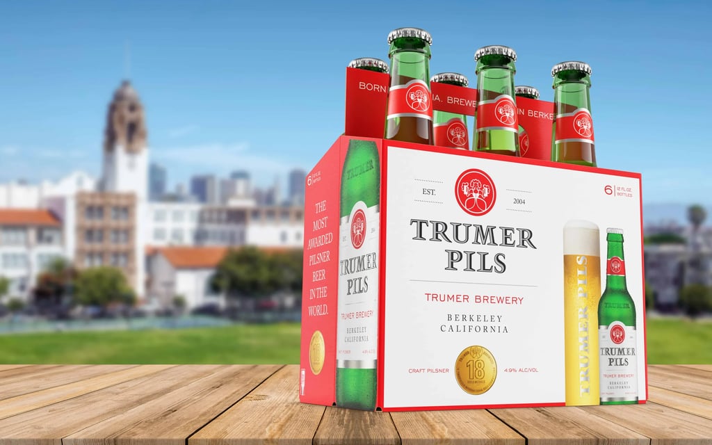Trumer Pils beer bottles in packaging.
