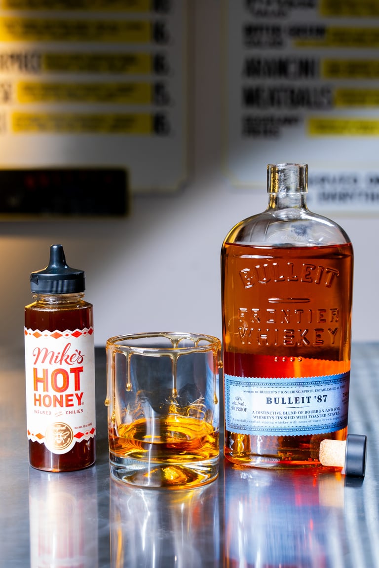 Bulleit and Mike’s Hot Honey Team Up for a Nationwide Whiskey-and-Food Tour