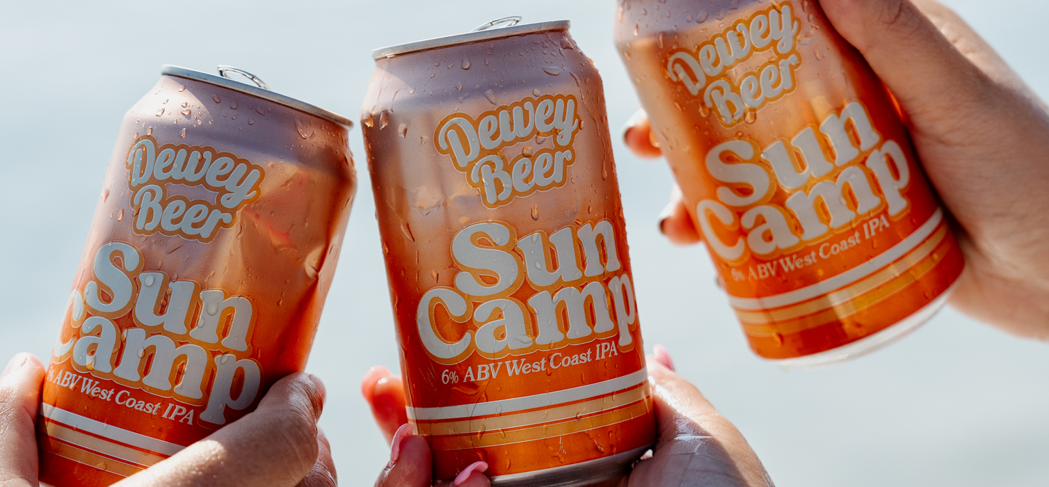 Cans of Sun Camp, a West Coast IPA from Dewey Beer Co